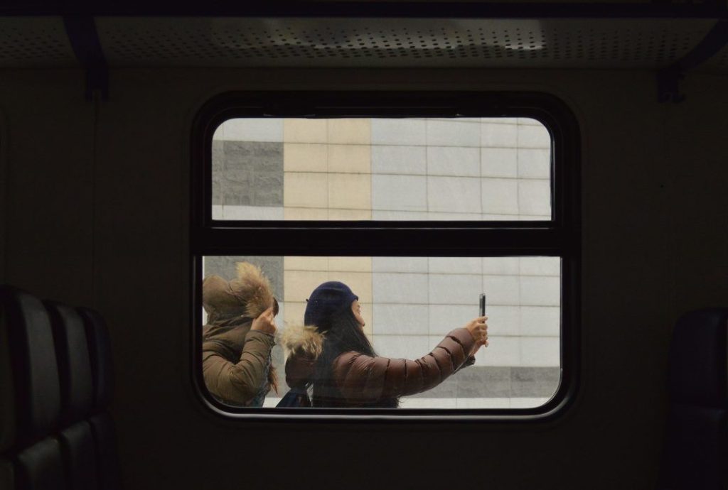 women taking selfie