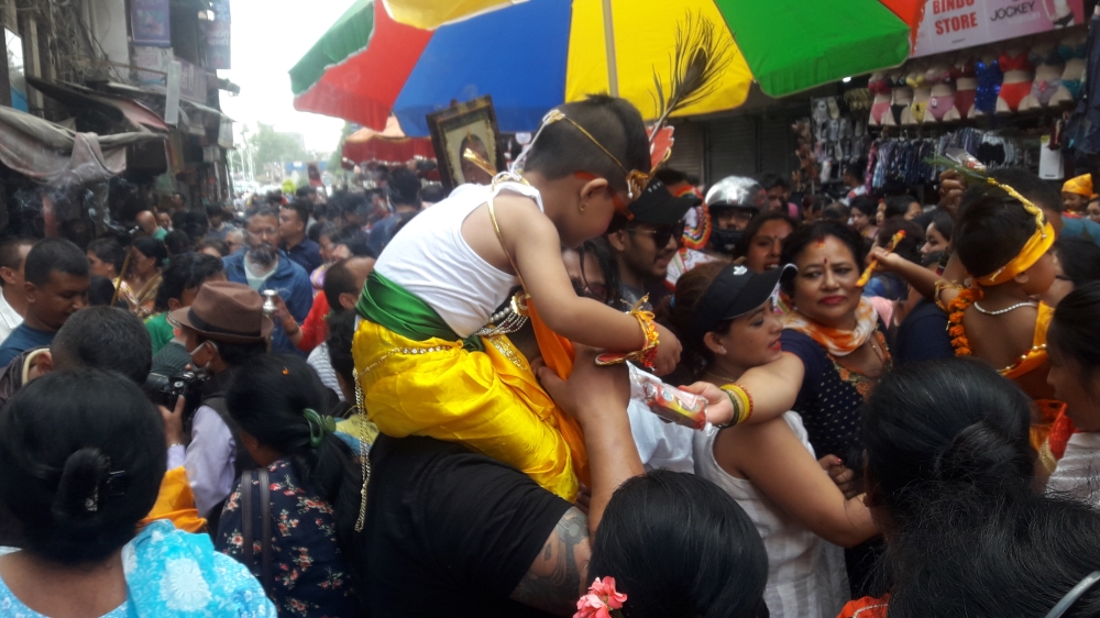 People at Gai Jatra parade Newari festivals