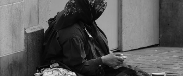 woman beggar on the streets