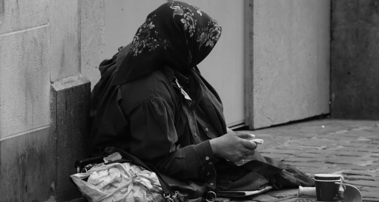 woman beggar on the streets